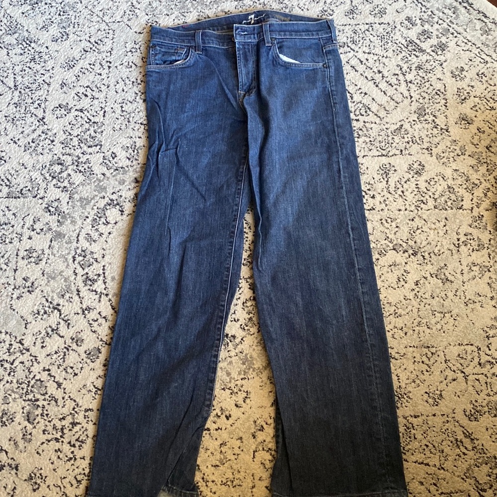 Mens relaxed fit seven jeans. Extra wear on right thigh (see pic)